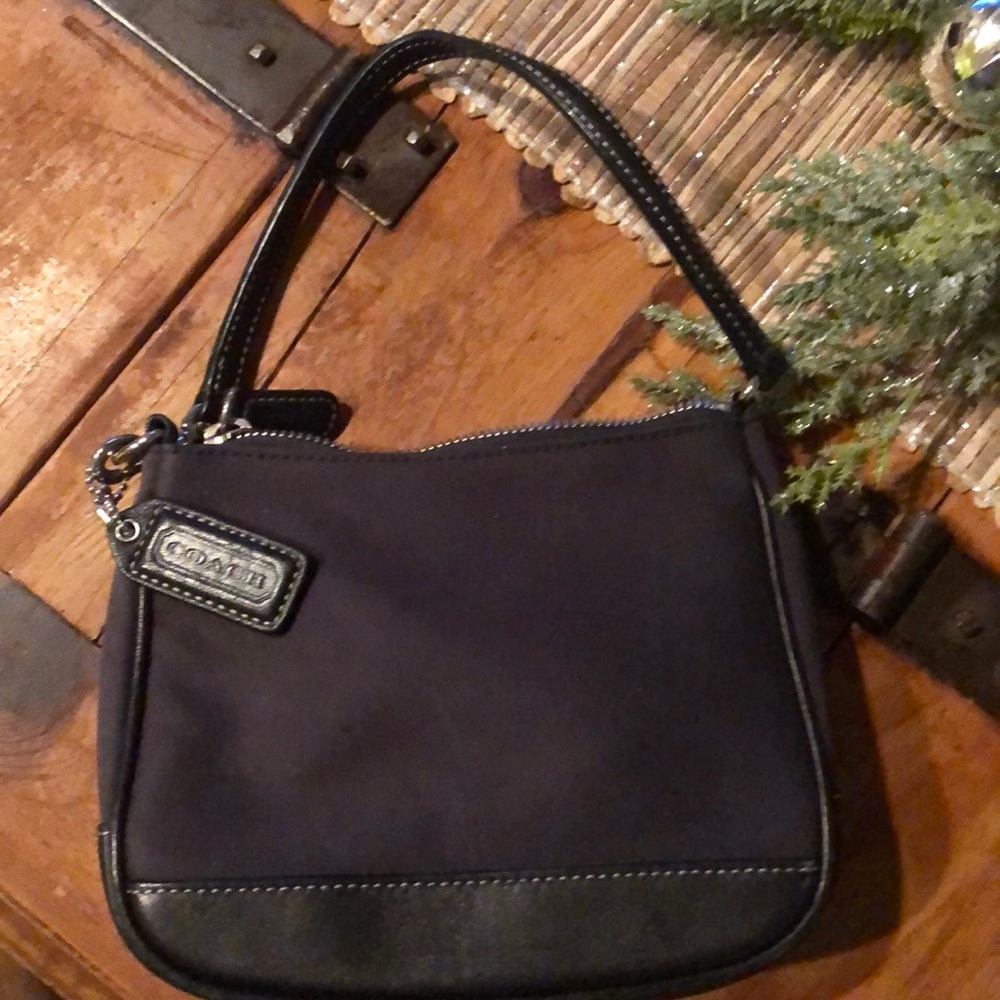 Black Coach mini pocketbook